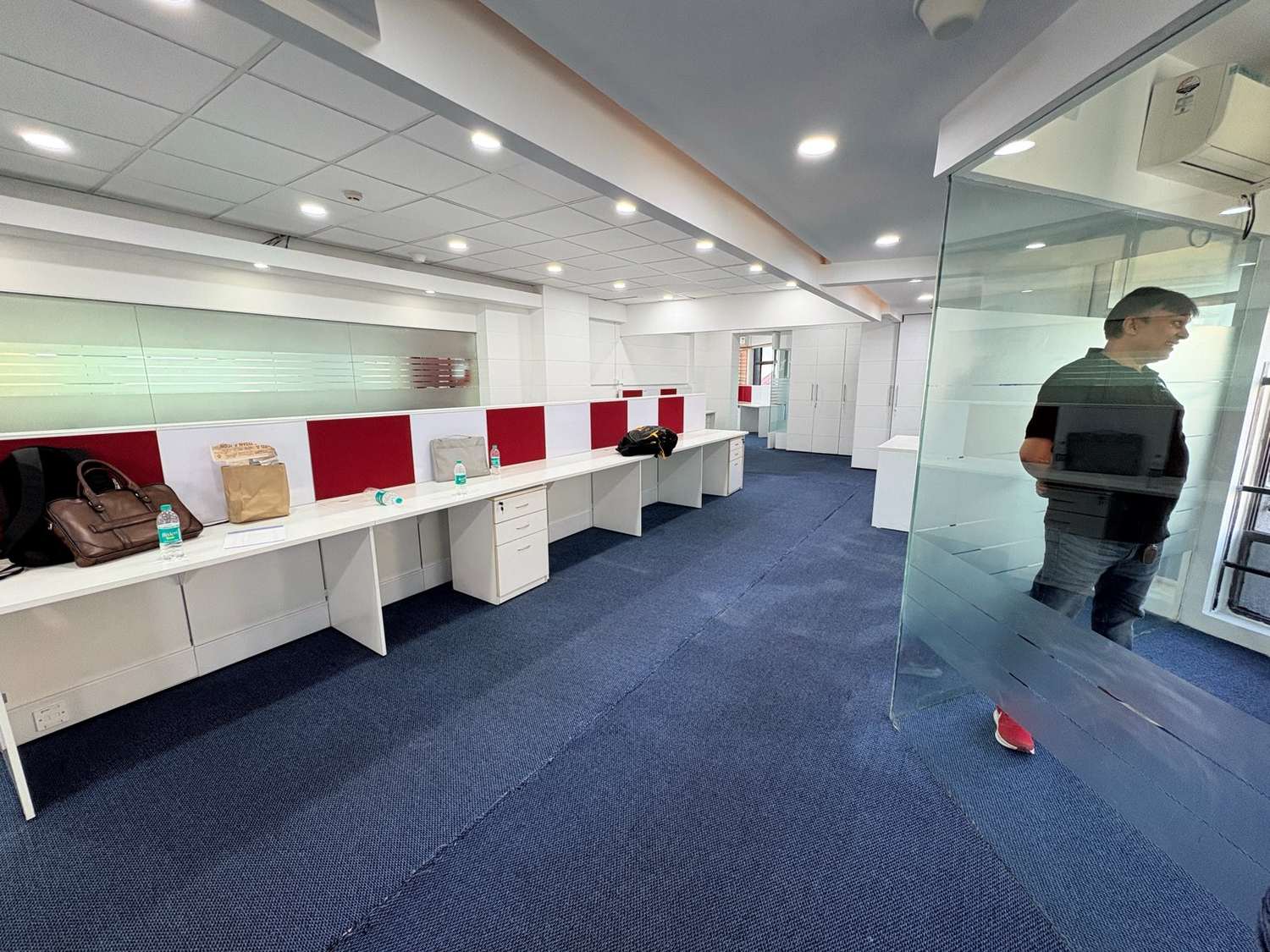 The new tiramai office floor at Prestige Meridian, with desks along the window line